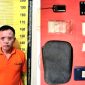MR (51 thn), warga Singopolo, Kecamatan Bangil, saat diamankan di Mapolres Pasuruan (foto: ist)
