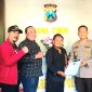 Berkas Laporan Sejumlah Aktivis, secara resmi diterima oleh Kapolresta Kota Probolinggo, AKBP. Wadi Sa'bani (dok. Harianjatim.id)
