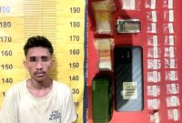 Tersangka RA (25 thn), warga Dusun Tuban, Desa Gendro, Kecamatan Tutur, saat diamankan di Mapolres Pasuruan, (foto: ist)