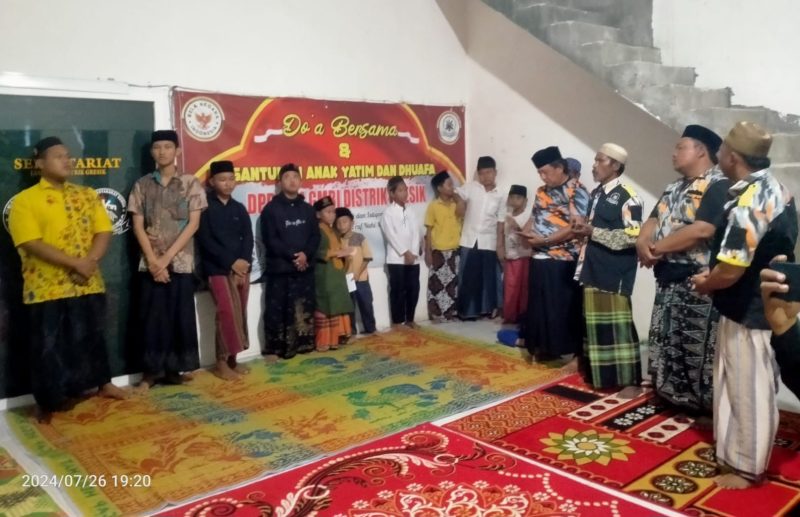 Kegiatan Peduli dan berbagi LSM GMBI Distrik Gresik (Dok.Harianjatim.id)