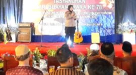 AKP. Marti, selaku Kapolsek Kajayan,  saat memberikan sambutan pada HUT Bhayangkara Ke-78, di halaman Mapolsek Kejayan (dok.Harianjatim.id)