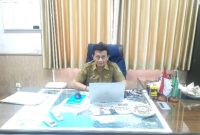 Plt. Dinas Bina Marga dan Bina Konstruksi Kabupaten Pasuruan, Eko B.W, saat dikonfirmasi di ruang kerjanya (Dok. Harianjatim.id)
