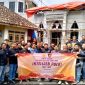 Kasat intelkam polres Pasuruan AKP. Lubis saat memimpin Bakti sosial di selah-selah riding di desa (foto: ist)